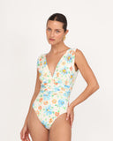 Angled view of the GIARDINO 04 one-piece swimsuit with ruched waist