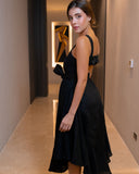 Side view of black linen resort dress with tailored waist