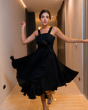 CASSIS black linen dress with fluid skirt and elegant movement