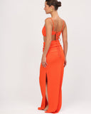 Back view of Dolce Estate orange textured high-waisted skir