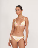Front view of Gioia di Sole triangle bikini top in ivory floral print with braided straps.