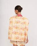 Back view of Gioia di Sole floral blazer showing relaxed silhouette and soft drape