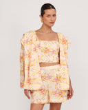 Gioia di Sole floral blazer styled with matching top and shorts, coordinated resort outfit