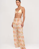 Angled front view of Gioia di Sole sheer mesh pants showing soft transparency and flow.