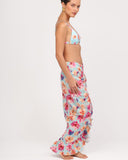 Side view of floral maxi skirt showing silhouette and ruched detail