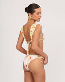 Side view of SABBIA bikini top showing fit and gathered wide straps