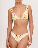 Detail of SABBIA bikini top featuring exclusive floral print and refined stitching