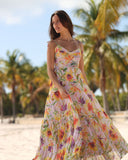 SABBIA floral maxi dress flowing in motion on the beach
