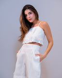 Scalea white linen crop top with delicate ruffle hem, luxury resortwear by PRAIA
